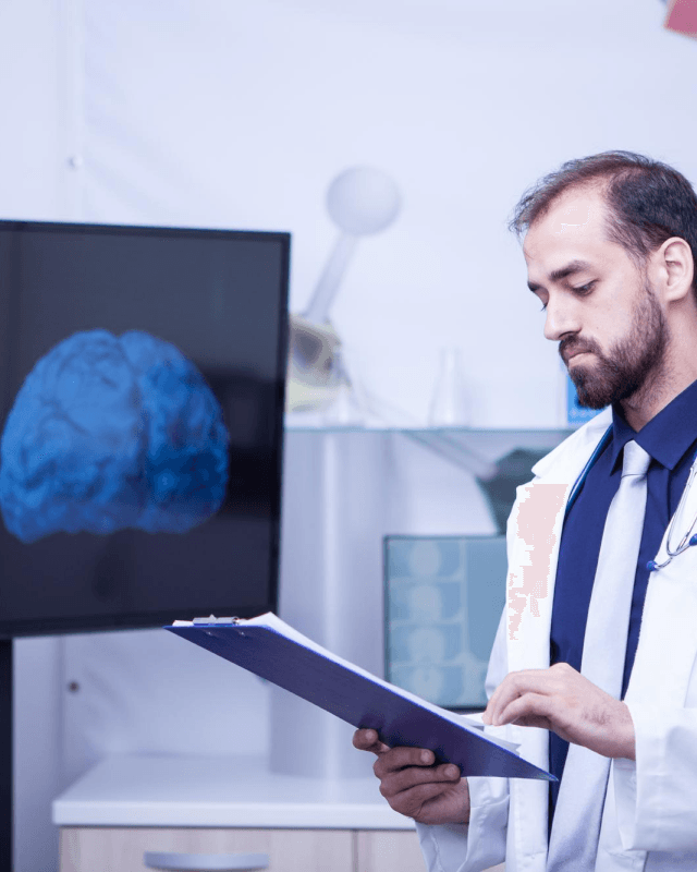 confident-young-doctor-with-clipboard